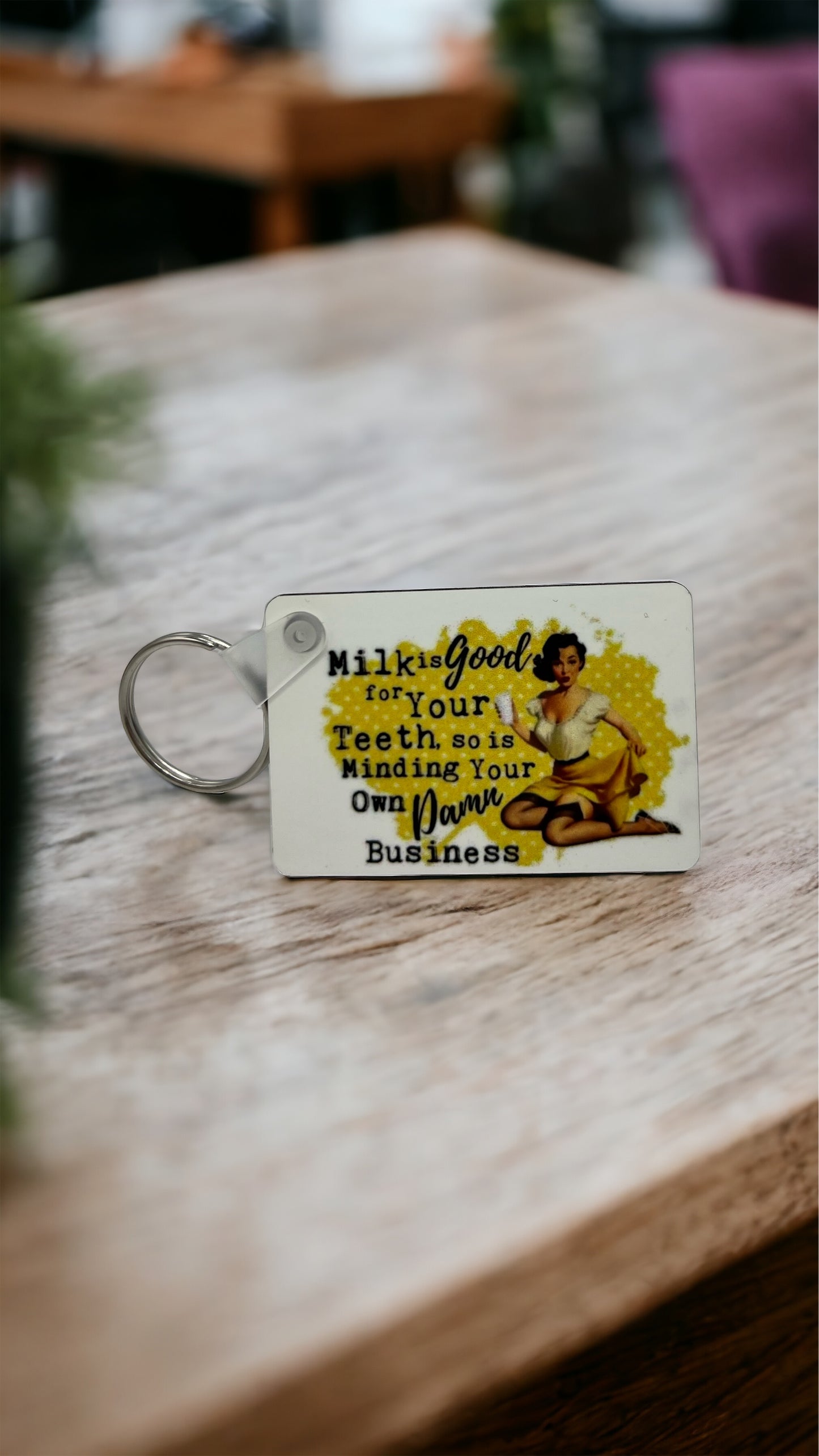 “Milk is Good for Your Teeth…so is Minding Your Own Damn Business” Keychain